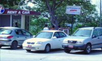 Car rental offices (in the parking area)